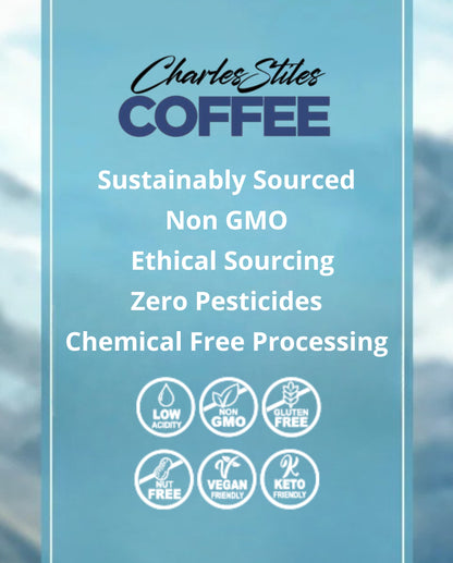 Product label for Charles Stiles Coffee with sustainability claims and certification logos on a blue background.